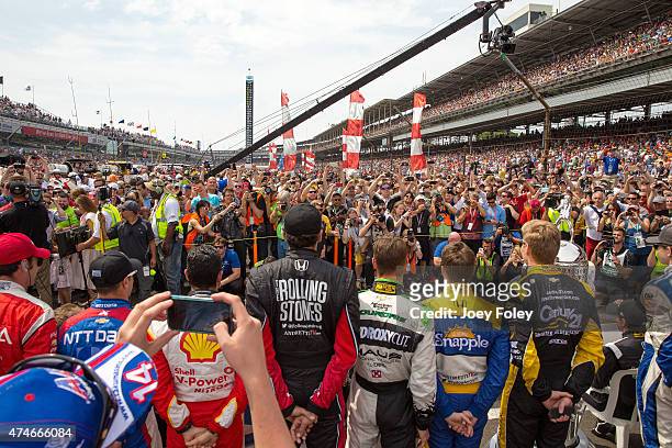 General view of the crowd from the track after driver introductions during the 2015 Indy 500 at Indianapolis Motorspeedway on May 24, 2015 in...