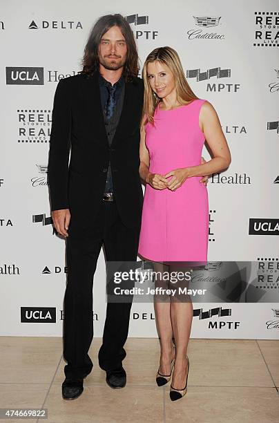 Actress Mira Sorvino and her husband, actor Christopher Backus arrive at the 4th Annual Reel Stories, Real Lives event benefiting the Motion Picture...