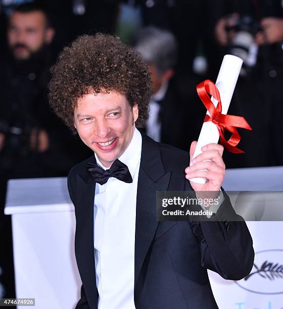 Mexican director Michel Franco poses after he received the Best Screenplay award for the film 'Chronic' during the Award Winners photocall at the...