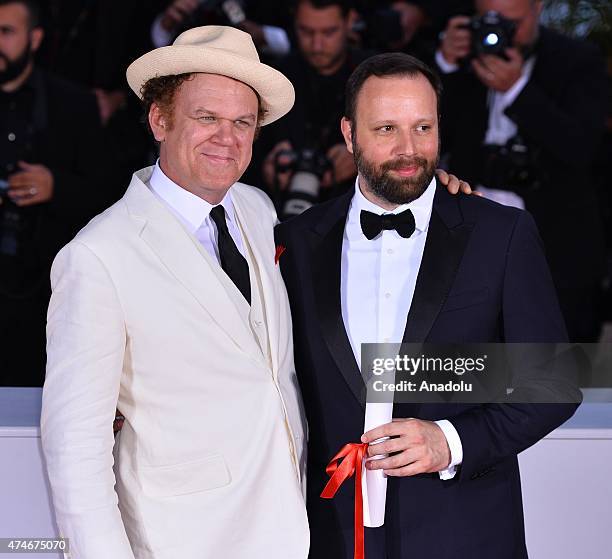 Greek director Yorgos Lanthimos poses with US actor John C Reilly after he won the Jury Prize for the film 'The Lobster' during the Award Winners...