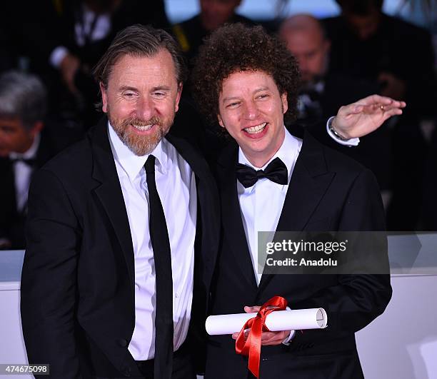 Mexican director Michel Franco poses with British actor Tim Roth after he received the Best Screenplay award for the film 'Chronic' during the Award...