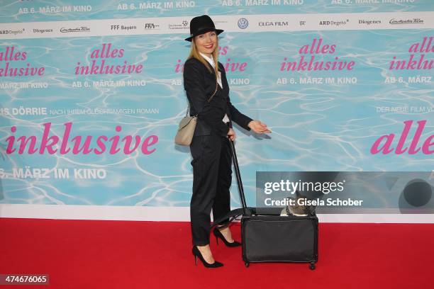 Nadja Uhl, dog Chica attend the German premiere of the film 'Alles Inklusive' at Mathaeser Filmpalast on February 24, 2014 in Munich, Germany.