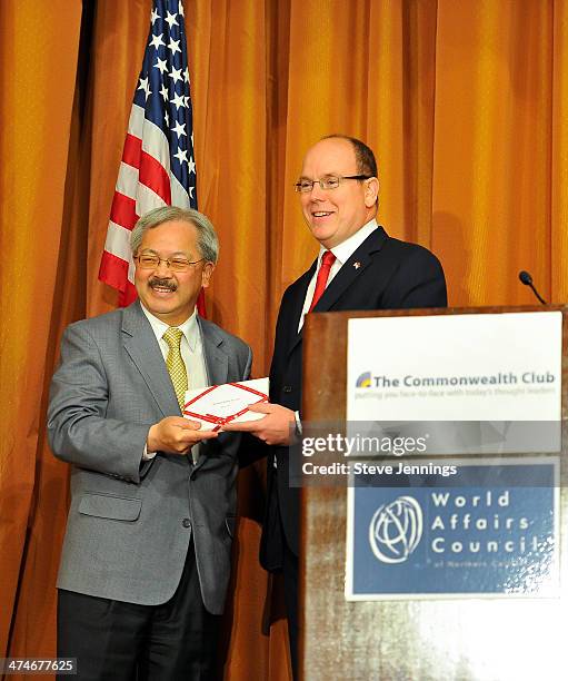 His Serene Highness Prince Albert II of Monaco presents a gift to San Francisco Mayor Ed Lee at the Commonwealth Club audience at the International...