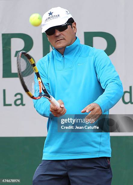 Toni Nadal, coach of his nephew Rafael Nadal directs a practice session prior to the French Open 2015 at Roland Garros stadium on May 22, 2015 in...