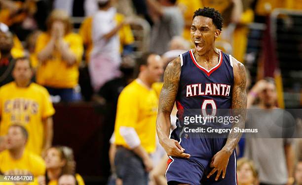 Jeff Teague of the Atlanta Hawks reacts in overtime against the Cleveland Cavaliers during Game Three of the Eastern Conference Finals of the 2015...