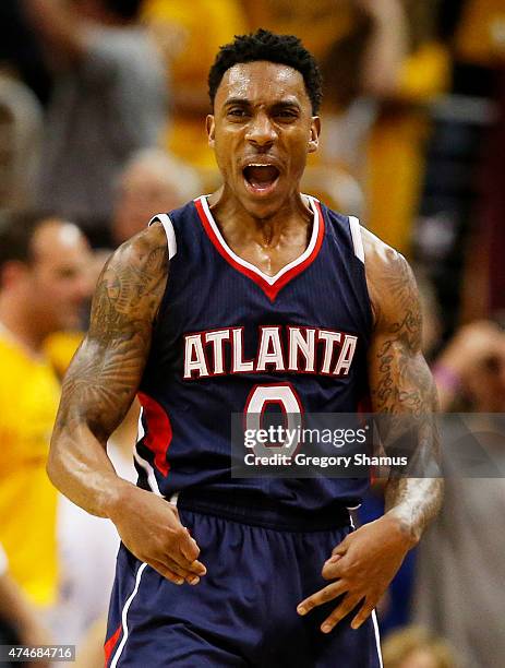 Jeff Teague of the Atlanta Hawks reacts in overtime against the Cleveland Cavaliers during Game Three of the Eastern Conference Finals of the 2015...