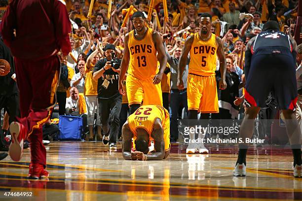 LeBron James of the Cleveland Cavaliers celebrates a victory in Game Three of the Eastern Conference Finals against the Atlanta Hawks during the 2015...