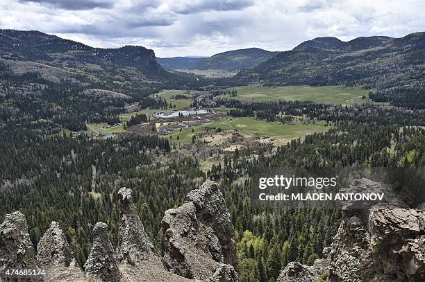 View of a valley in the Rocky Mountains near Pagosa Springs, Colorado, taken on May 14, 2015. AFP PHOTO / MLADEN ANTONOV