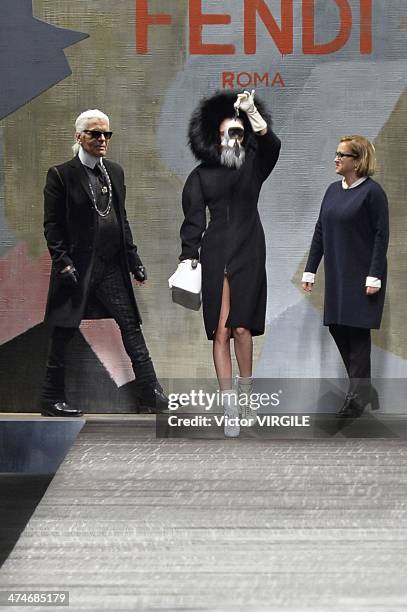 Fashion designer Karl Lagerfeld, model Cara Delevingne and Silvia Venturini Fendi walk the runway during the Fendi Ready to Wear Fall/Winter...