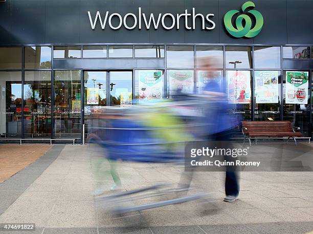 Shopper walks out of Woolworths supermarket on May 25, 2015 in Melbourne, Australia. In a bid to regain its title as Australia's distinguished...