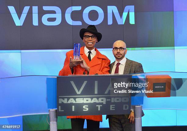 Personality RuPaul and Executive Vice President of MTV and General Manager of MTV2, Chris McCarthy ring the closing bell at NASDAQ MarketSite on...