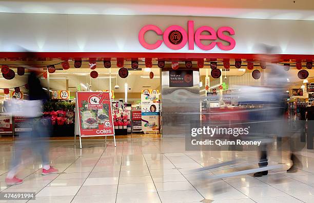 Shopper walks out of Coles supermarket on May 25, 2015 in Melbourne, Australia. In a bid to regain its title as Australia's distinguished retailer,...