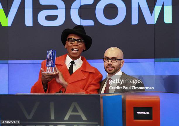 RuPaul and Executive Vice President of MTV & General Manager of MTV2, Chris McCarthy, ring the closing bell at NASDAQ MarketSite on February 24, 2014...