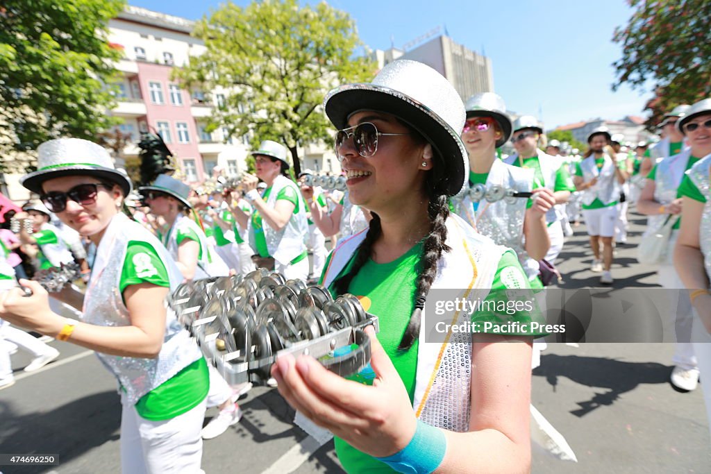 Artist with costumes at the Carnival of Cultures at...