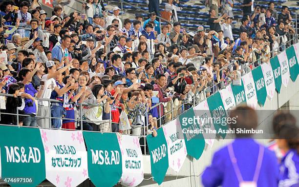 Japanese supporters celebrate the 1-0 win after the women's soccer international friendly match between Japan and New Zealand at Kagawa Prefectural...