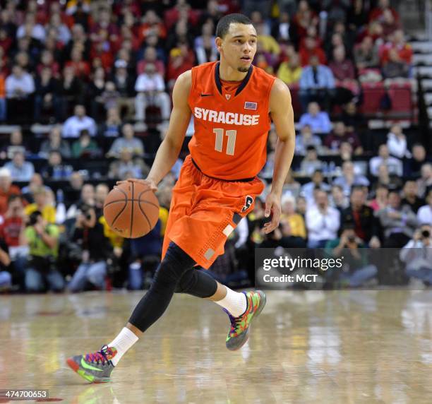 Syracuse guard Tyler Ennis looks for an open teammate in the second half as the Syracuse Orange beat the University of Maryland 57-55 at Comcast...