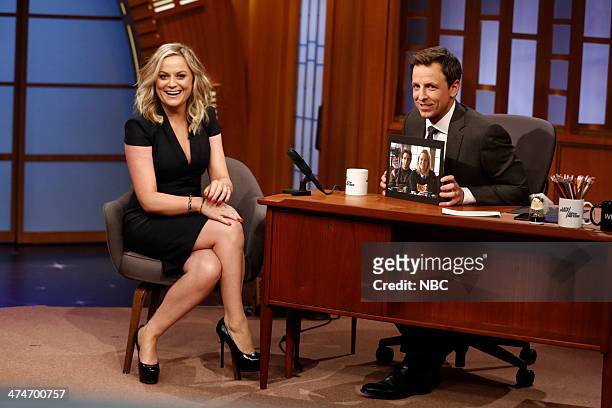 Episode 0001 -- Pictured: Actress Amy Poehler during an interview with host Seth Meyers on February 24, 2014 --