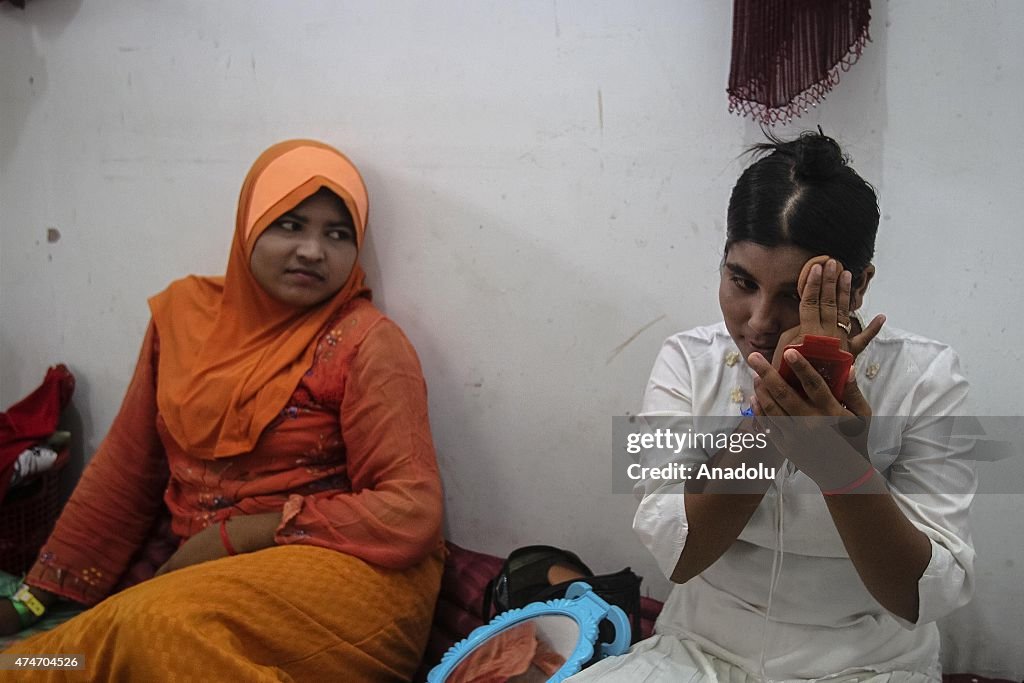 Rohingya migrants take shelter in Aceh