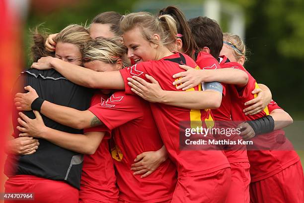 Sophie Goerner of Leipzig jubilates with team mates after scoring the first goal during the Women's Second Bundesliga match between FFV Leipzig and...