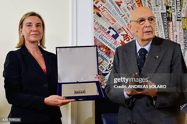 European Union Foreign Policy chief Federica Mogherini receives the 2015 prize of the Institute for International Policy Studies from the hands of...