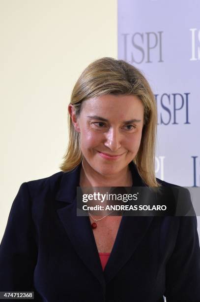 European Union Foreign Policy chief Federica Mogherini smiles after being awarded with the 2015 prize of the Institute for International Policy...