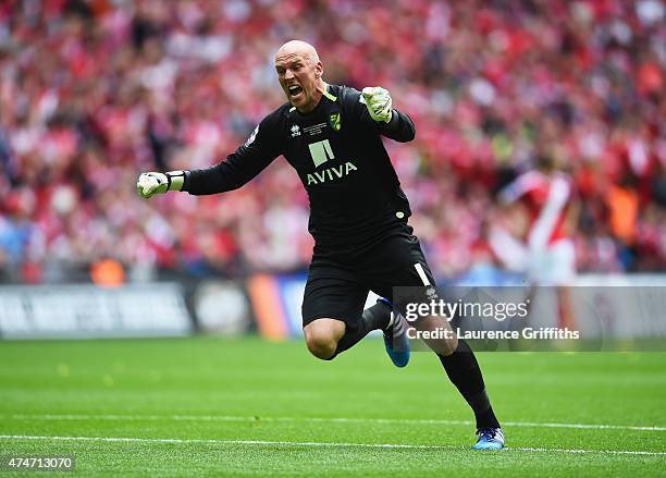 John Ruddy of Norwich City celebrates as Cameron Jerome of Norwich City scores their first goal during the Sky Bet Championship Playoff Final between...