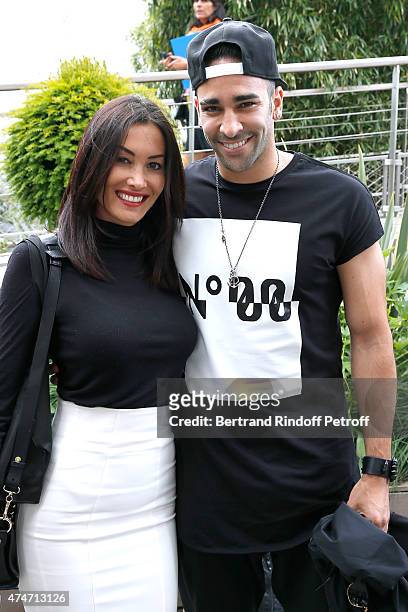Milan AC French Football player Adil Rami and his companion Sidonie attend the 2015 Roland Garros French Tennis Open - Day 2, on May 25, 2015 in...