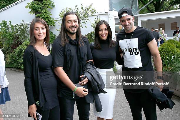 Moundir, his wife Ines, Milan AC French Football player Adil Rami and his companion Sidonie attend the 2015 Roland Garros French Tennis Open - Day 2,...