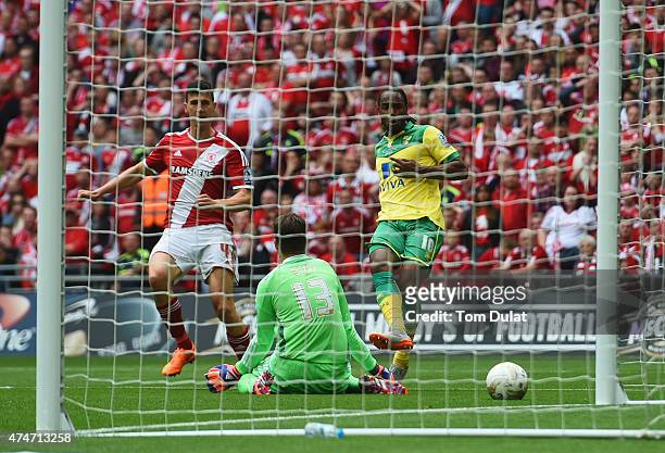 Cameron Jerome of Norwich City scores their first goal past gaolakeeper Dimitrios Konstantopoulos of Middlesbrough during the Sky Bet Championship...