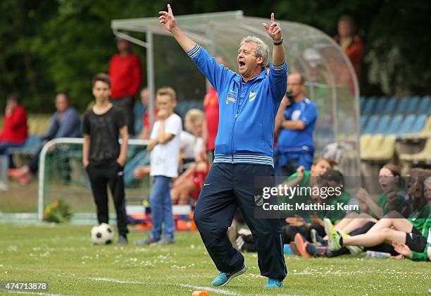 Head coach Juergen Franz of Luebars shows his delight after winning the Women's Second Bundesliga match between FFV Leipzig and 1.FC Luebars at...