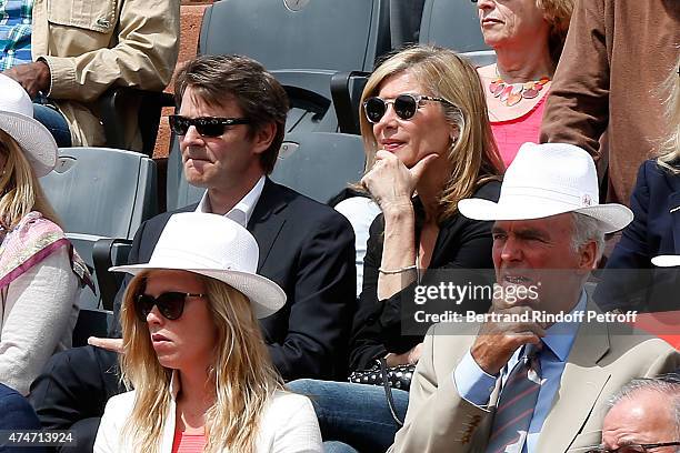 Politician Francois Baroin and his companion actress Michele Laroque attend the 2015 Roland Garros French Tennis Open - Day 2, on May 25, 2015 in...