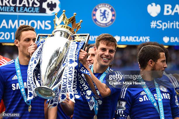 Cesar Azpilicueta of Chelsea celebrates with the trophy after the Barclays Premier League match between Chelsea and Sunderland at Stamford Bridge on...