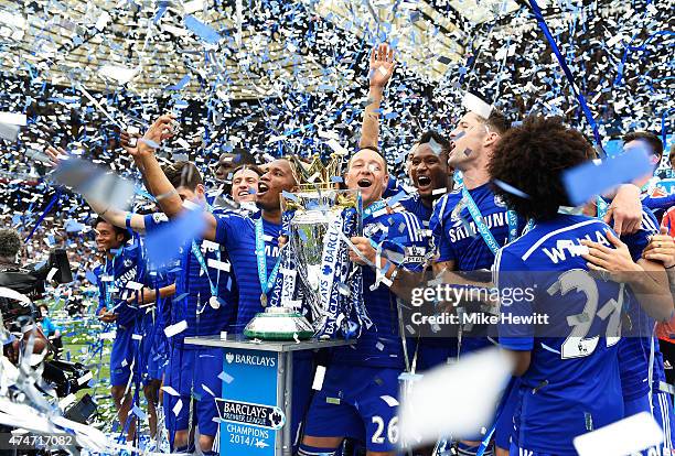 John Terry of Chelsea celebrates lifts the trophy alongside team mates after the Barclays Premier League match between Chelsea and Sunderland at...