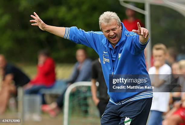 Head coach Juergen Franz of Luebars shows his delight after winning the Women's Second Bundesliga match between FFV Leipzig and 1.FC Luebars at...