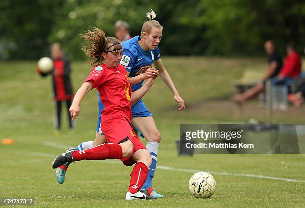 Jolanta Siwinska of Luebars battles for the ball with Laura Birne of Leipzig during the Women's Second Bundesliga match between FFV Leipzig and 1.FC...
