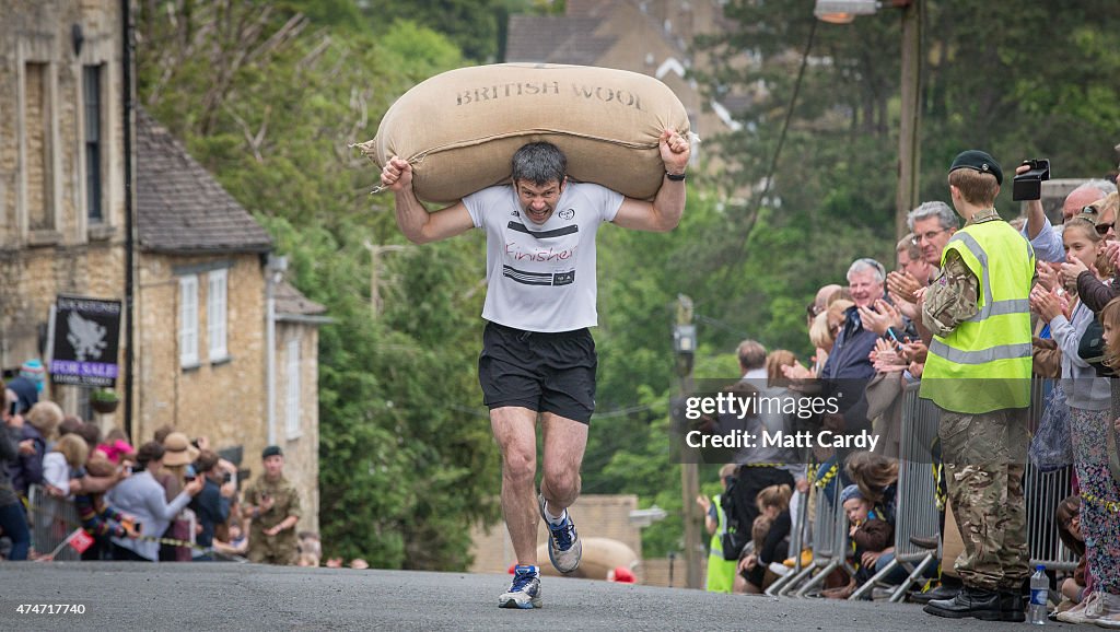 Traditional Bank Holiday Monday Woolsack Race Takes Place In Tetbury