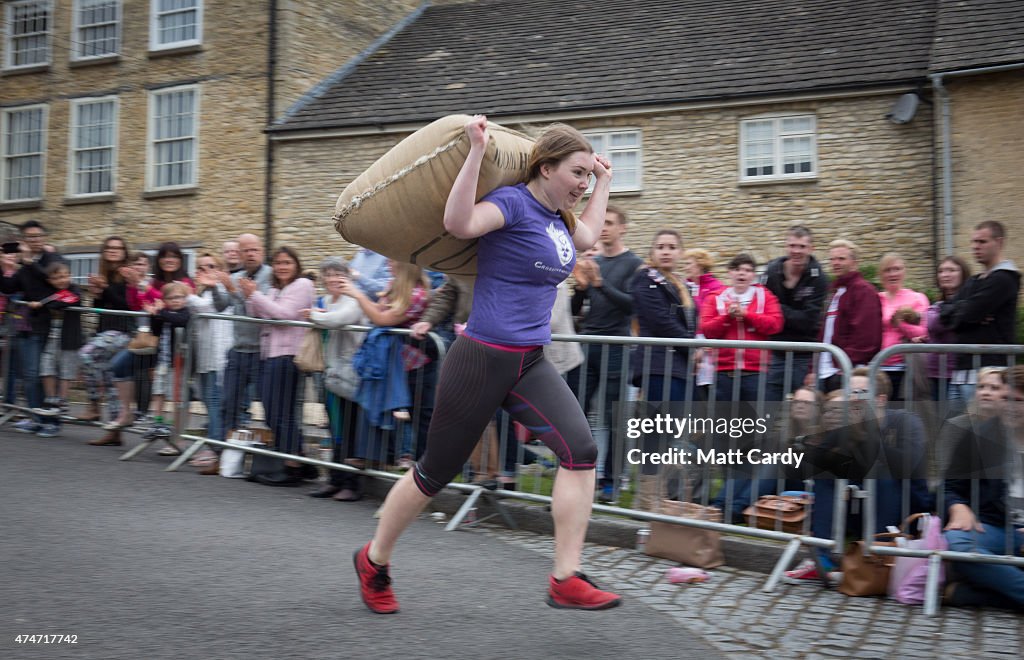 Traditional Bank Holiday Monday Woolsack Race Takes Place In Tetbury