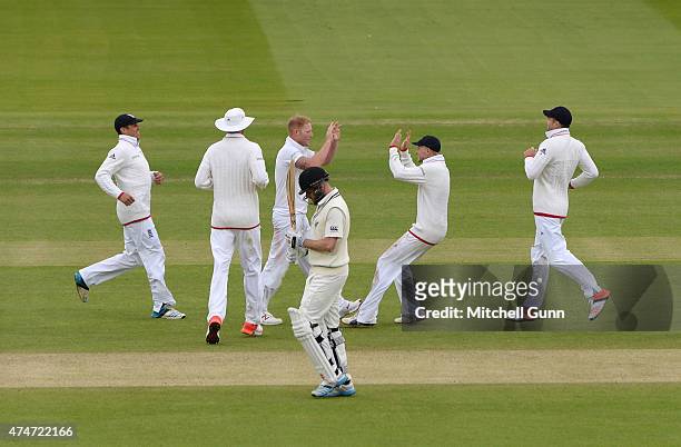 Ben Stokes of England celebrates taking the wicket of Mark Craig during day five of the 1st Investec Test match between England and New Zealand at...
