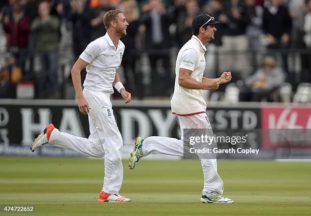 England captain Alastair Cook and Stuart Broad celebrate after winning the 1st Investec Test match between England and New Zealand at Lord's Cricket...