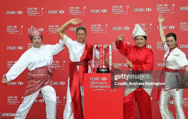 Shanshan Feng of China, Suzann Pettersen of Norway, Inbee Park of South Korea and Paula Creamer of the USA strike a pose next to the trophy during a...
