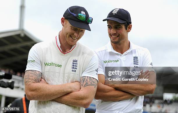 England captain Alastair Cook speaks with Ben Stokes of England after winning the 1st Investec Test match between England and New Zealand at Lord's...