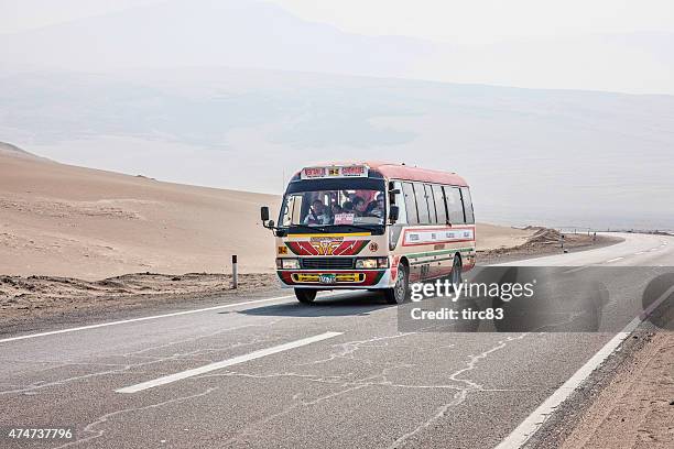 bus travelling on pan-american highway through peru - pan am stock pictures, royalty-free photos & images