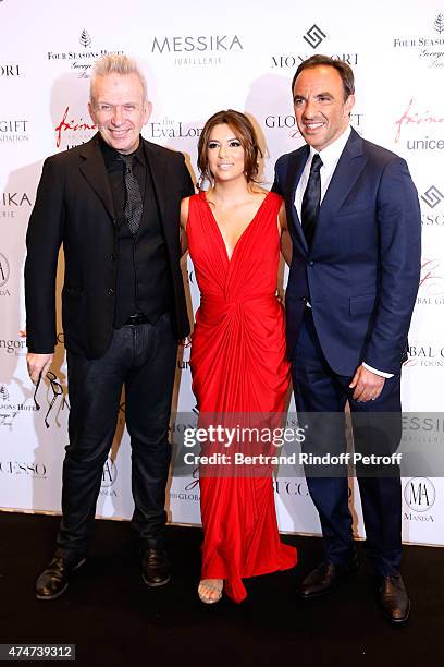 Fashion designer Jean-Paul Gaultier, Eva Longoria and Journalist Nikos Aliagas attend the Global Gift Gala : Photocall. Held at Four Seasons Hotel...