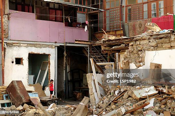 demolished houses. poor children. - azerbaijan children stock pictures, royalty-free photos & images