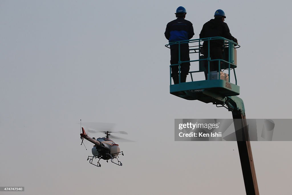 YAMAHA's Unmanned Helicopter Sprays Pesticides In Scenic Miho Pine Grove