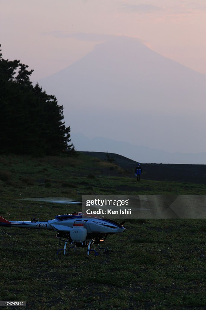 YAMAHA's Unmanned Helicopter Sprays Pesticides In Scenic Miho Pine Grove