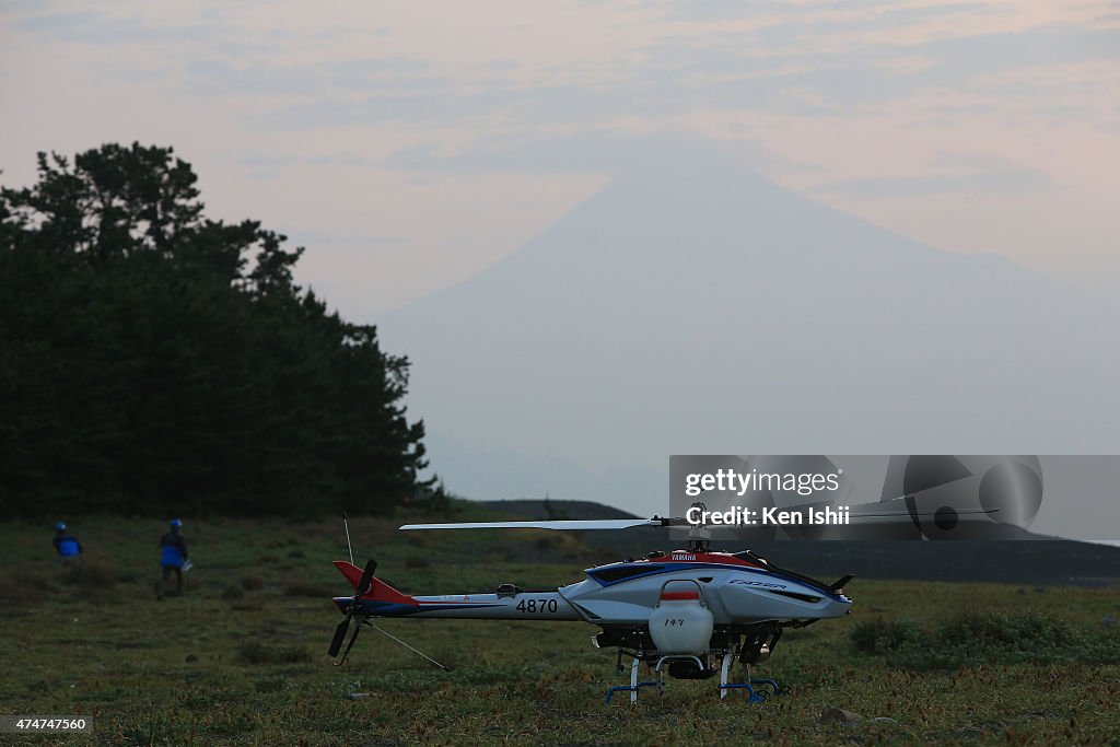 YAMAHA's Unmanned Helicopter Sprays Pesticides In Scenic Miho Pine Grove