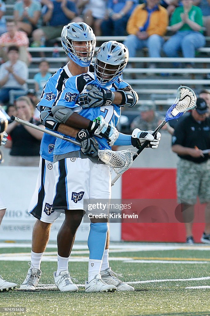 Ohio Machine Jovan Miller of the Ohio Machine is congratulated by Kevin Cooper of ...