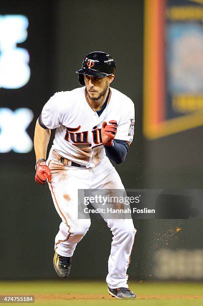 Jordan Schafer of the Minnesota Twins runs towards third base against the Detroit Tigers during the game on April 27, 2015 at Target Field in...