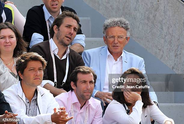 Arnaud di Pasquale and Nelson Monfort attend day 2 of the French Open 2015 at Roland Garros stadium on May 25, 2015 in Paris, France.